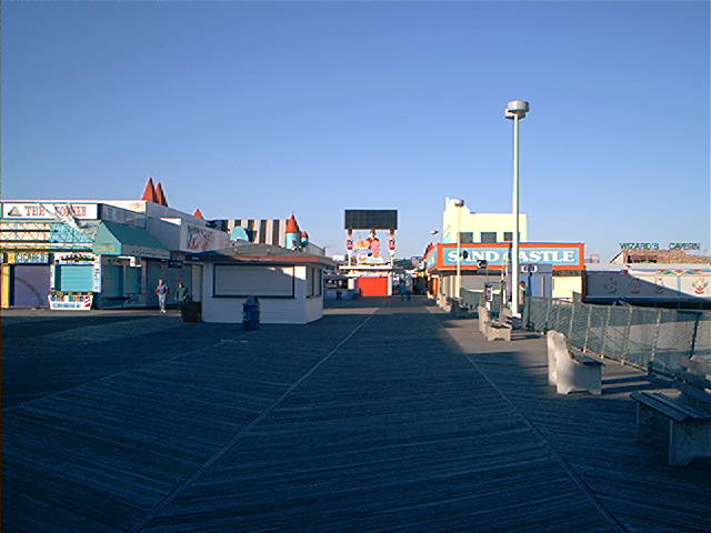 Joggers on the Boardwalk in Seaside.